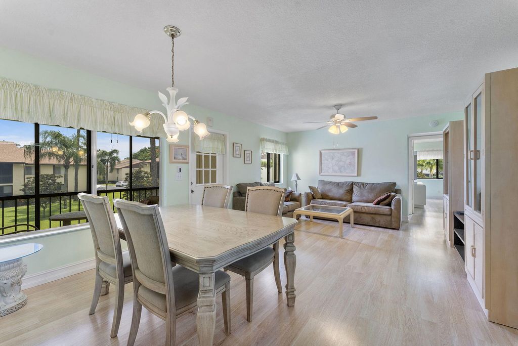 Photo of 301 Knotty Pine Circle #C-2, Greenacres, FL 33463 (MLS # R11103864)