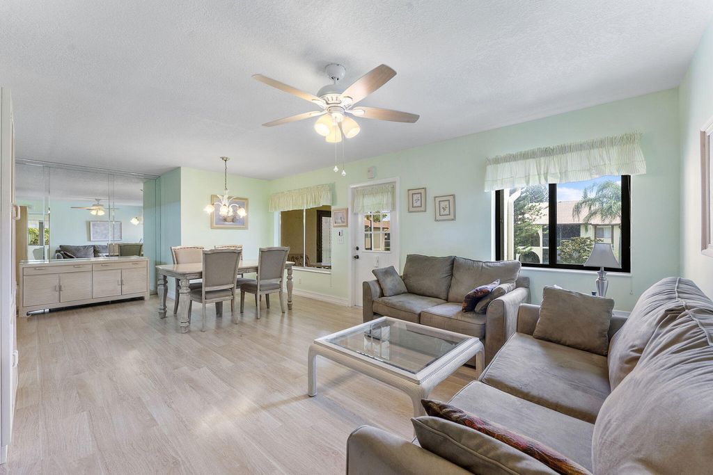 Photo of 301 Knotty Pine Circle #C-2, Greenacres, FL 33463 (MLS # R11103864)