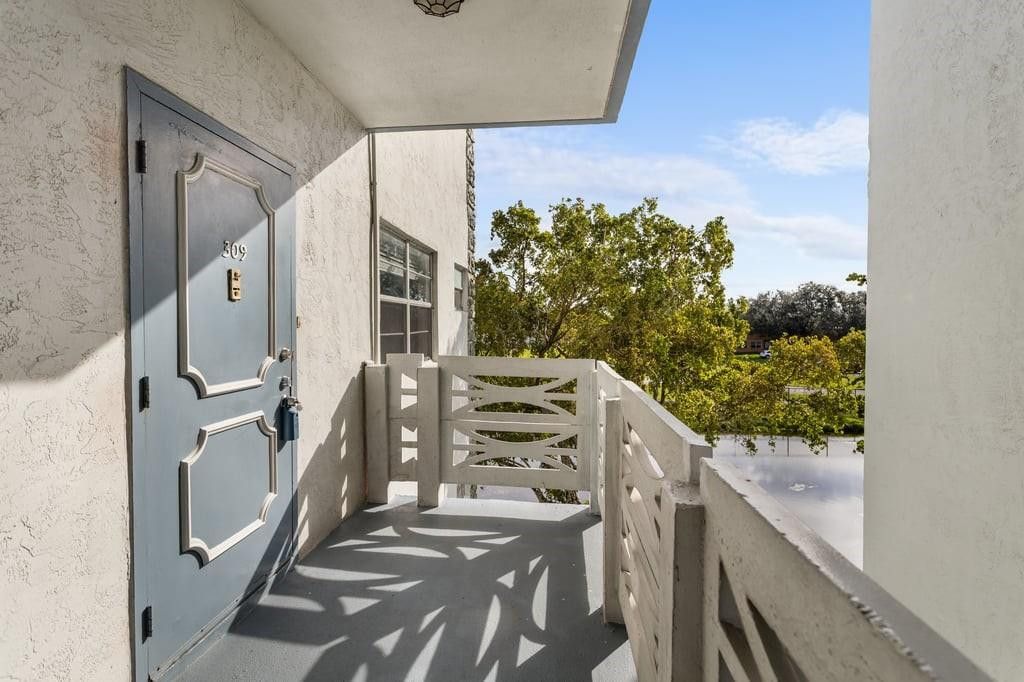 Photo of 4090 NW 42nd Avenue #309, Lauderdale Lakes, FL 33319 (MLS # F10535318)