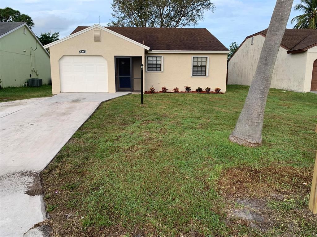 Photo of 5794 SE Mitzi Lane, Stuart, FL 34997 (MLS # R10765404)