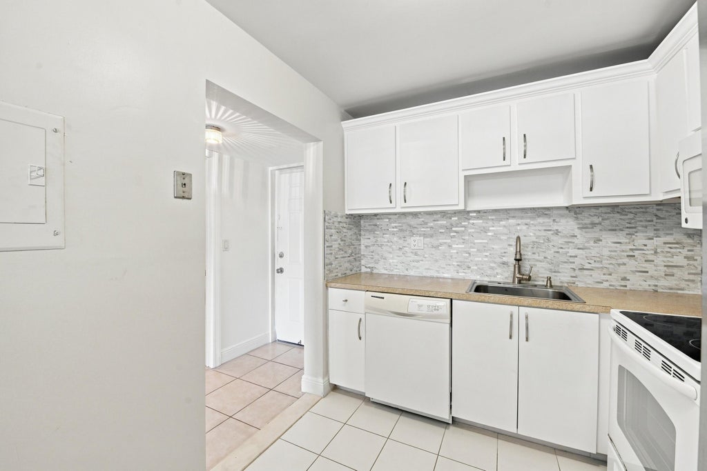 Photo of 9300 SW 8th Street #219, Boca Raton, FL 33428 (MLS # B26066456)
