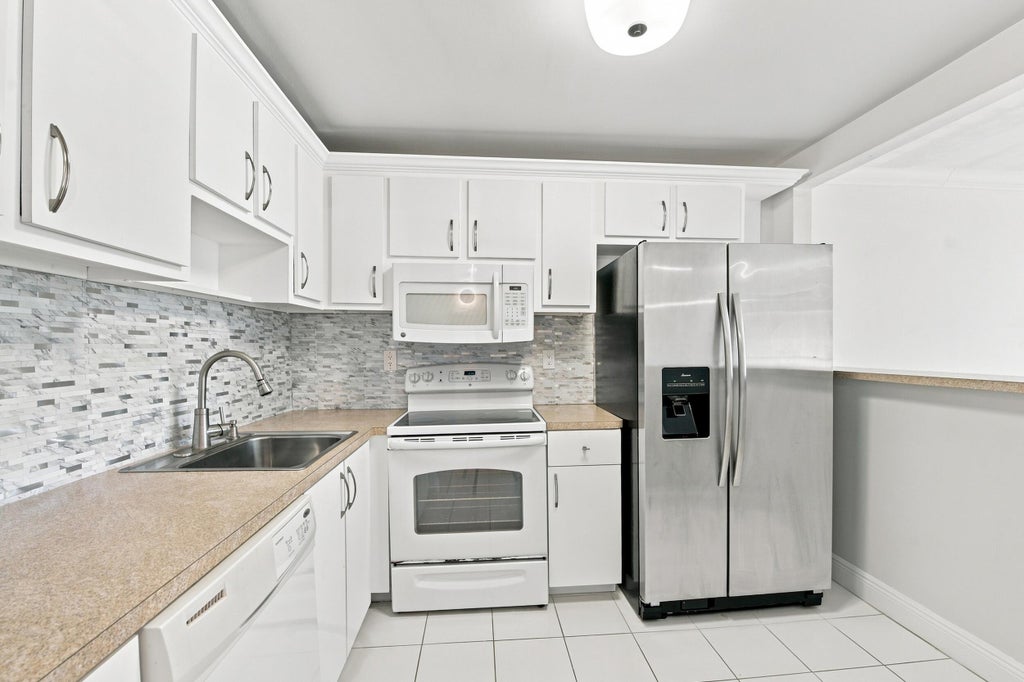 Photo of 9300 SW 8th Street #219, Boca Raton, FL 33428 (MLS # B26066456)