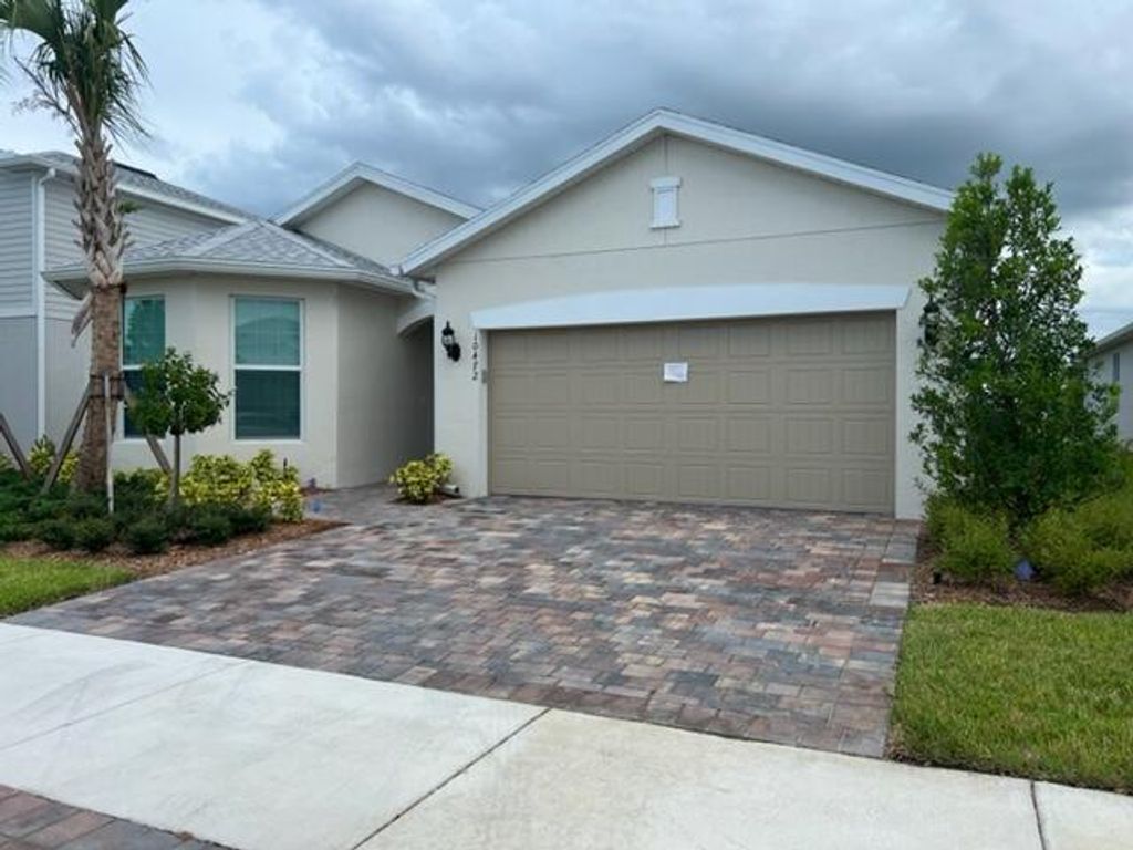Photo of 10472 SW Captiva Drive Dr, Port Saint Lucie, FL 34987 (MLS # R10828415)