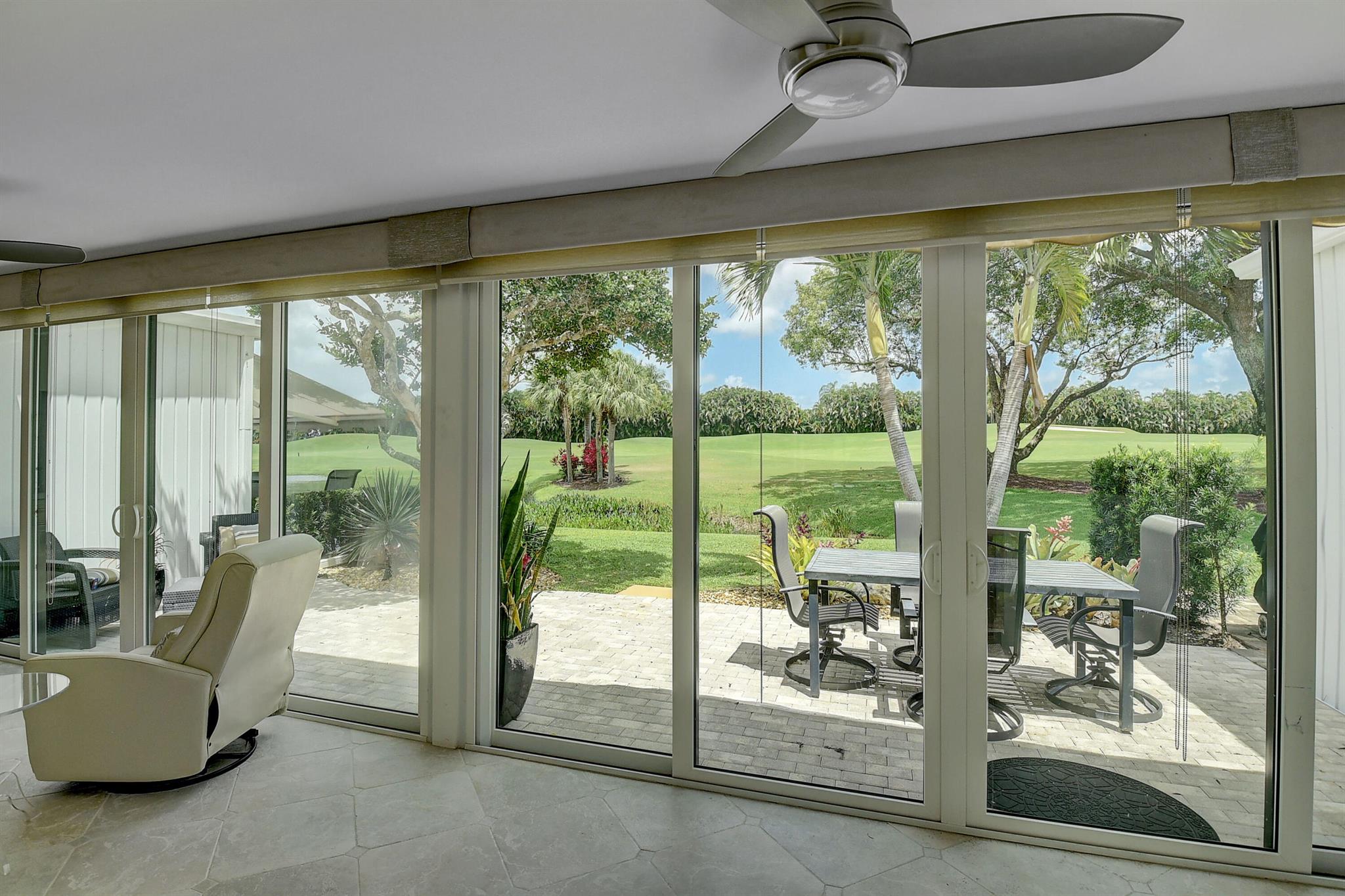 Beautiful rental with NO Membership! Landscaped patio overlooks picture-postcard private view with no cart path nearby. Recently renovated 2/2 villa with attached Full 2-car garage, white gloss kitchen, vaulted ceiling, skylights, high-hat lighting,fans. Master bedroom has huge storage with wall of built-in drawers and closets. Watch golfers swing and birds and otters flourish on beautifully landscaped grounds of Boca West Country Club. Nite Landscaping on back patio. Enjoy covered electronic awning. Second bedroom/office. 4 TVs and cable and internet included. Peppertree 1 is wonderfully maintained and offers renters a large, heated pool and hot tub. Water Filtration full-house. Like new Washer/Dryer. BBQ allowed. Queen-size bed with adjustable base/Sleep Number mattress
