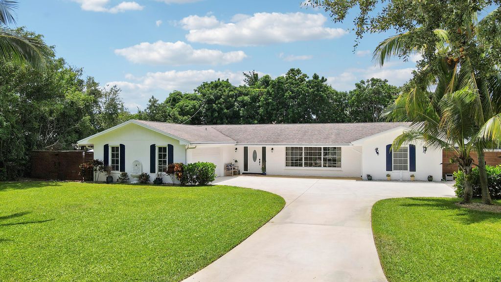 Photo of 339 Country Club Drive, Tequesta, FL 33469 (MLS # R11114805)