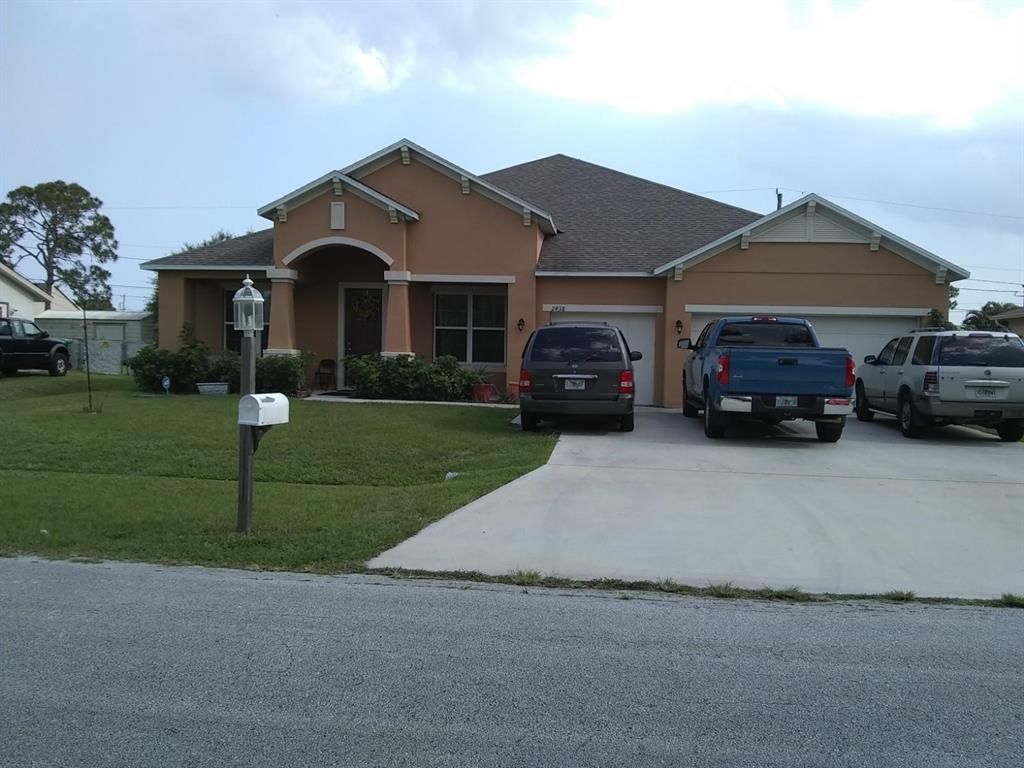 Photo of 2438 SE Betty Road, Port Saint Lucie, FL 34952 (MLS # R10616286)