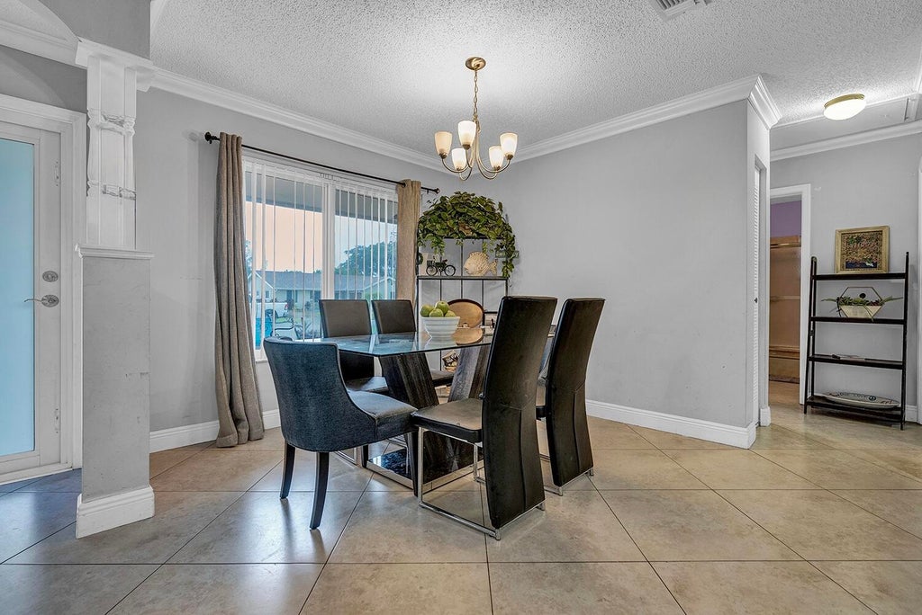 Photo of 9544 Richmond Circle, Boca Raton, FL 33434 (MLS # B26044736)
