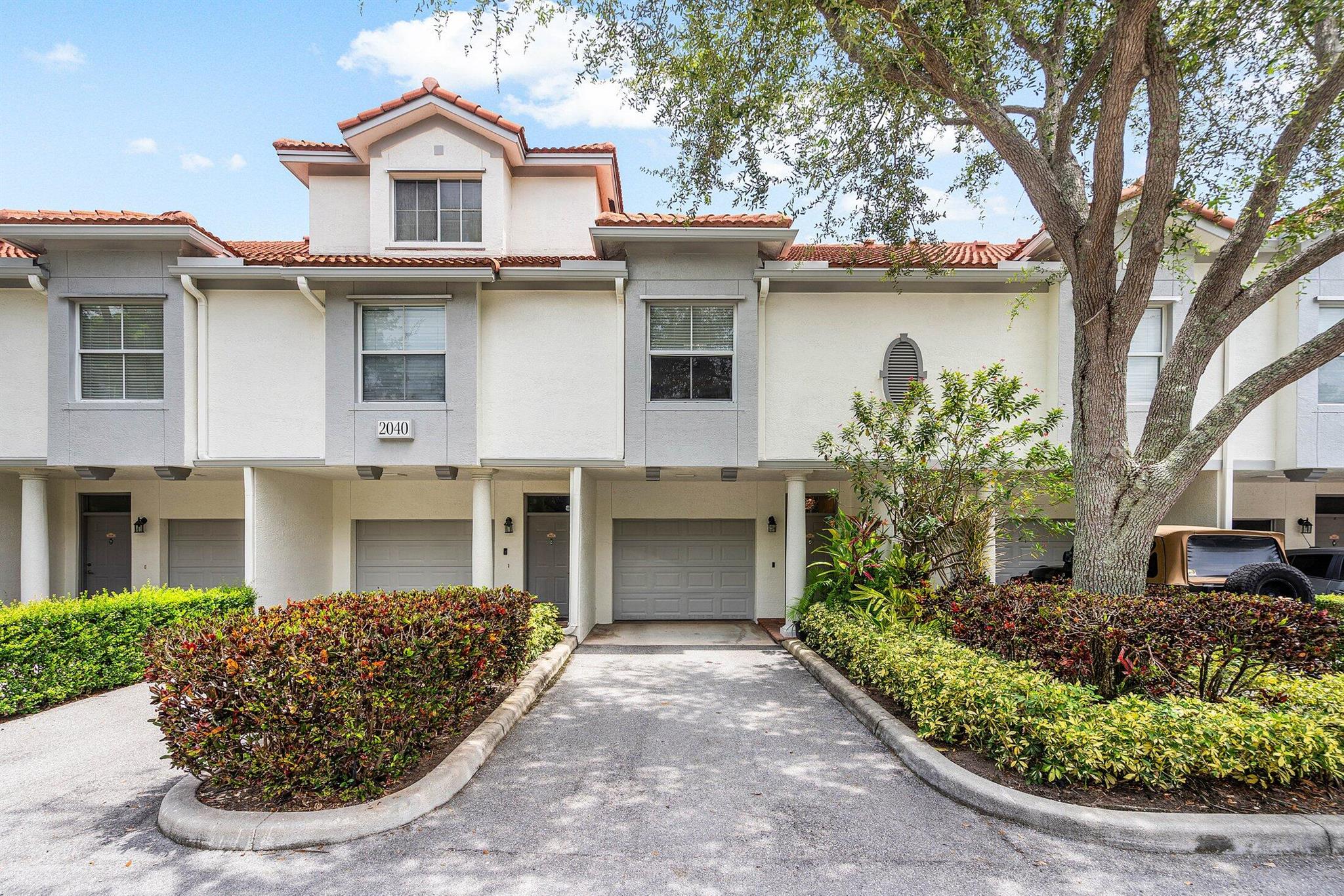 The best East Delray location offers a 3-floor Townhouse with direct lake views. Enjoy Sun and moonrise views from your living room and master bedroom. A full 1-car garage, driveway, and plenty of guest parking. The community is under excellent management and was just painted, with new roofs, roads, and well-manicured landscape design. Complete with every great amenity like: walking path, full gym, volleyball, basketball, and tennis courts. Resort-style pool area, with spectacular clubhouse. Featuring a free community car wash. New washer and dryer, updated fixtures, and beautiful flooring. This fully updated turn-key unit is move-in ready. Schedule your tour today.