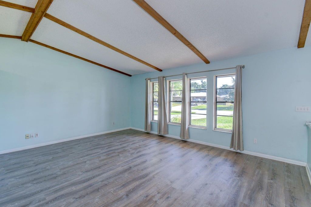 Photo of 5241 SE Meadow Springs Boulevard, Stuart, FL 34997 (MLS # R10931468)