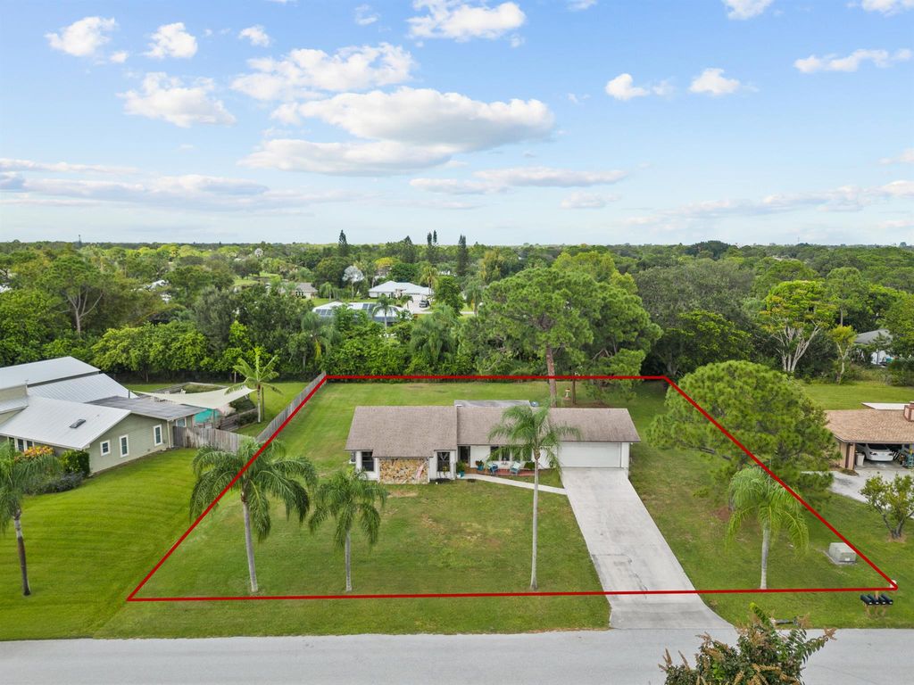 Photo of 5241 SE Meadow Springs Boulevard, Stuart, FL 34997 (MLS # R10931468)