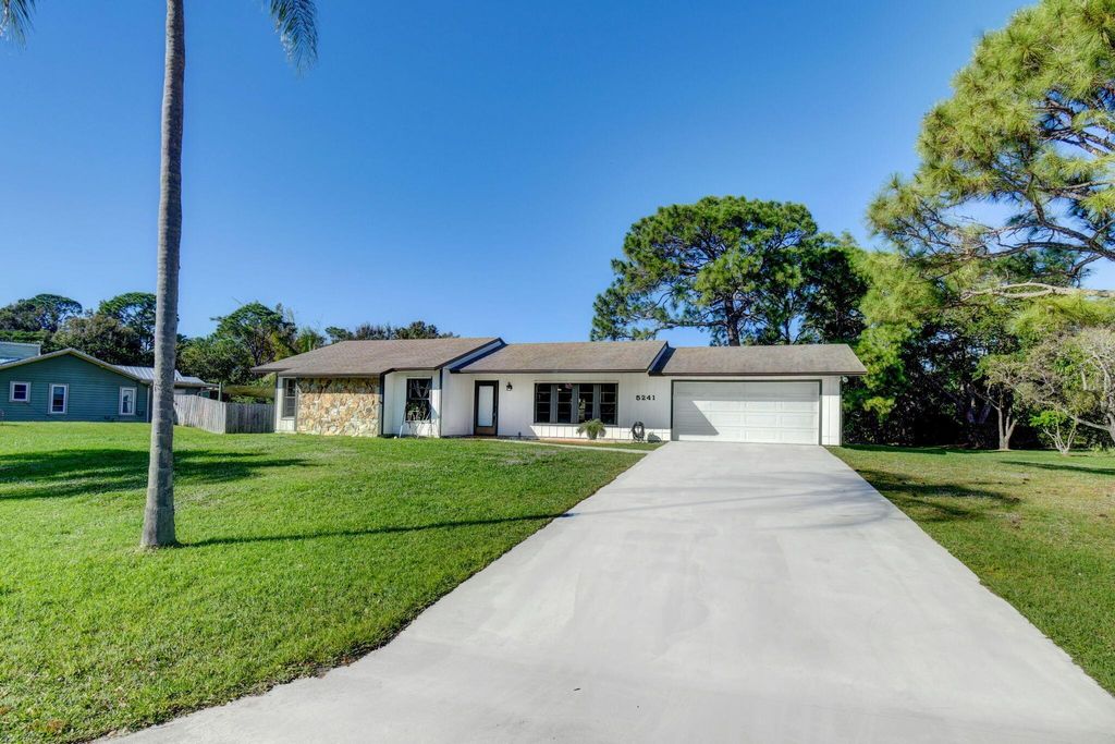 Photo of 5241 SE Meadow Springs Boulevard, Stuart, FL 34997 (MLS # R10931468)