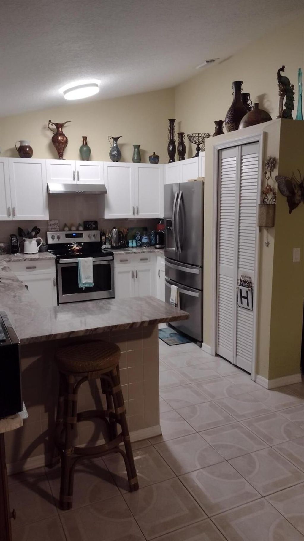 Photo of 1061 NW Tuscany Drive, Port Saint Lucie, FL 34986 (MLS # R10957970)