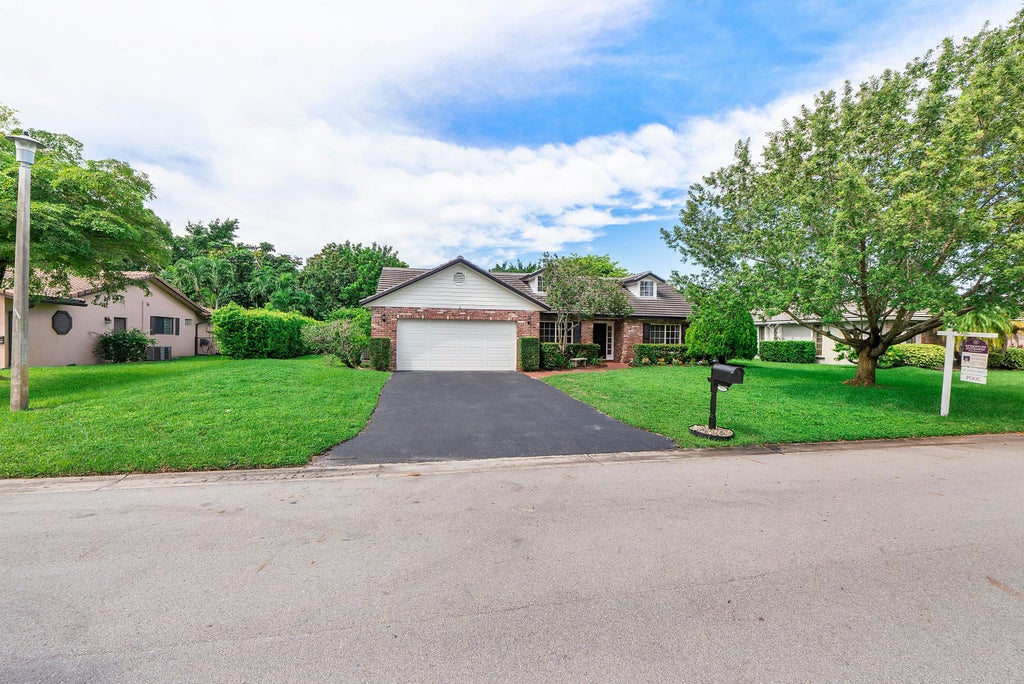 Photo of 1344 NW 100TH Avenue, Coral Springs, FL 33071 (MLS # B26079825)