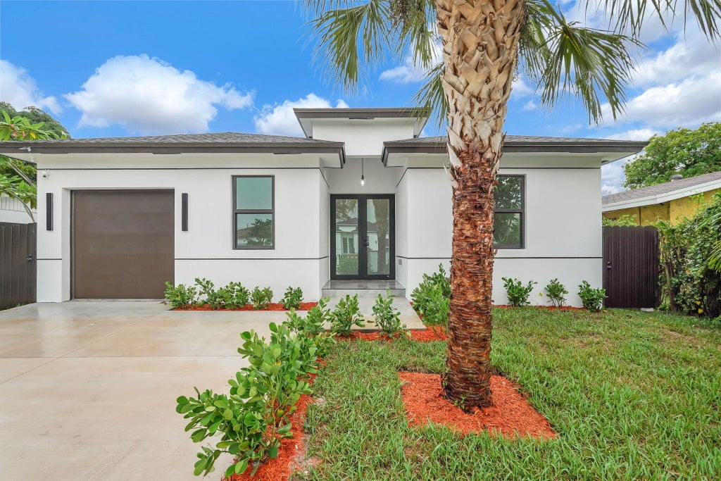 Photo of 2540 NW 14TH Court, Fort Lauderdale, FL 33311 (MLS # B26075559)