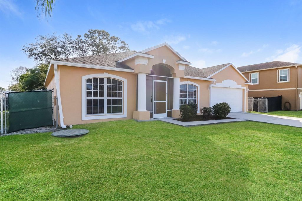 Photo of 385 NW Dorchester Street, Port Saint Lucie, FL 34983 (MLS # R11120448)