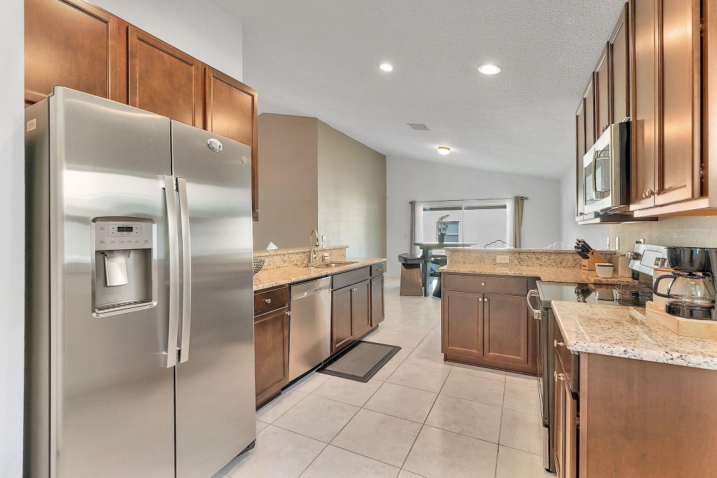 Photo of 9728 Starboard Drive, Fort Pierce, FL 34945 (MLS # R11019879)