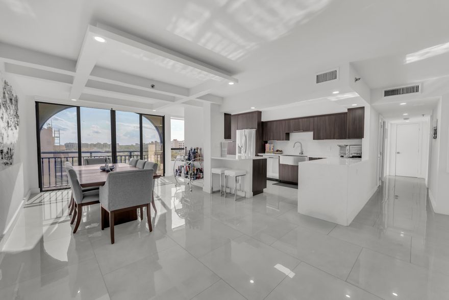 MUST SEE! Renovated three full bedrooms, three full bathroom private penthouse residence featuring your own private floor, and an expansive, completely finished outdoor terrace in the prestigious non-mandatory membership Boca Pointe Community. Fully remodeled with exceptional attention to detail and premium finishes throughout, including oversized porcelain tile flooring, modern LED lighting in every room, elegant quartz countertops, and high-end appliances. Enjoy spacious living, refined design, and unbeatable convenience just minutes from top-rated restaurants, shopping, and major highways. Boca Pointe offers the perfect blend of luxury, comfort, and a gated community—an exceptional place to call home.