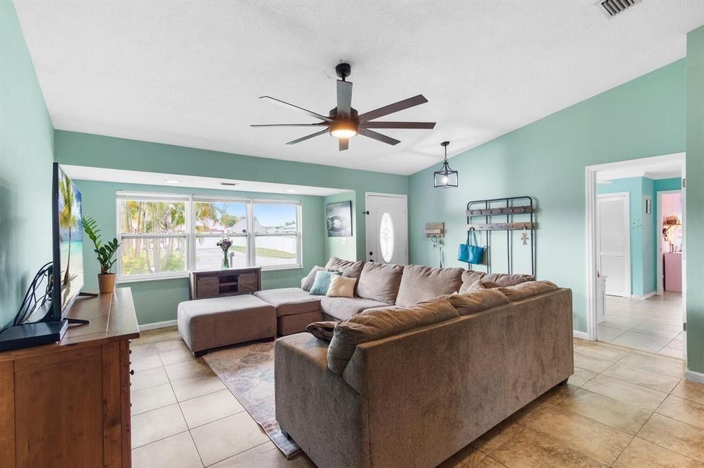 Photo of 709 SW Dorchester Street, Port Saint Lucie, FL 34983 (MLS # F10469248)