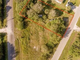 LAND HAS BEEN CLEARED AND CLEANED SINCE PHOTOS WERE TAKEN! Ready to build your dream home on a piece of land? This 0.22 acre piece of residential land is ready to be owned by you! This land is situated in a peaceful residential area with well-maintained surroundings, and is ideal for those seeking a serene environment away from the hustle and bustle of city life. Need financing? No problem. Reach out! Community is a NON HOA and approved for custom built or modular homes only. No manufactured mobile homes. Centrally located near elementary school, high school, college, hospital, convenient stores, and minutes from downtown City of Okeechobee. Community has sidewalks and school bus pick up routes. Accessible from 441 North or Hwy 98 North.