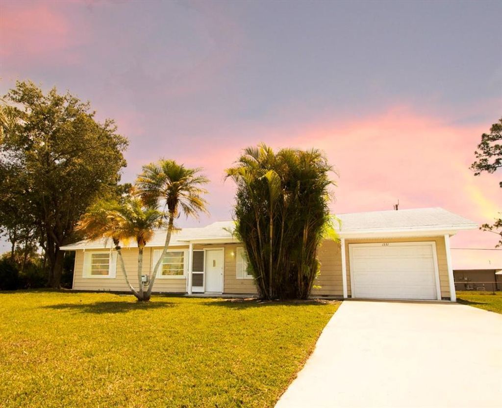 Photo of 1331 SW Prairie Circle, Port St Lucie, FL 34953 (MLS # R10889621)