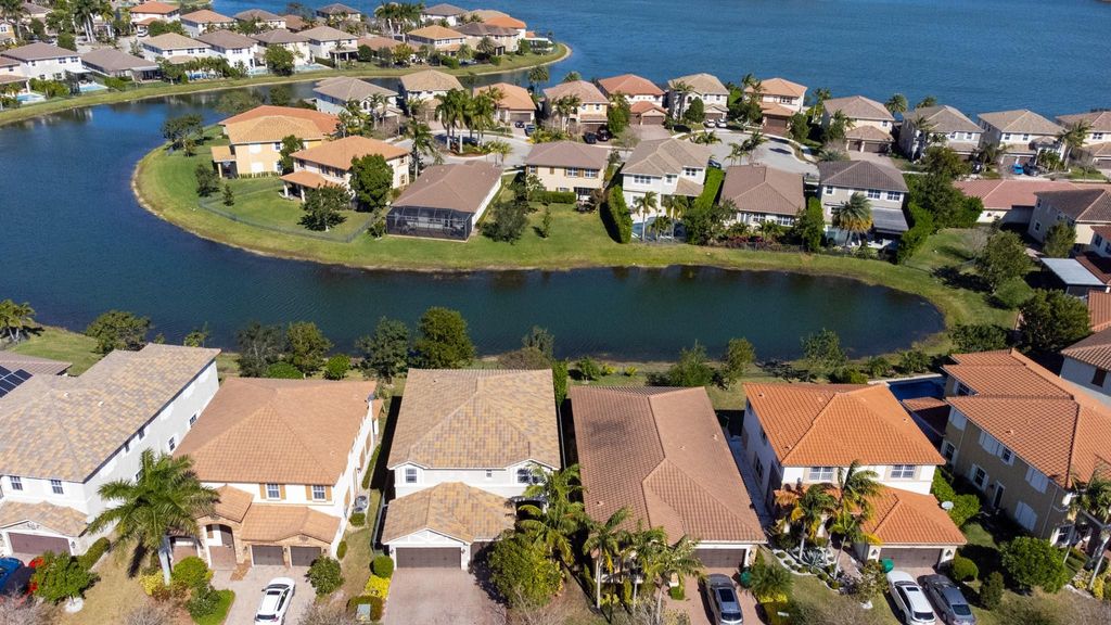 Photo of 9911 S Miralago Way, Parkland, FL 33076 (MLS # B26032256)