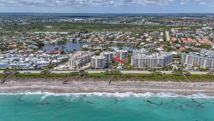 Incredible views from this 3 bedroom condo in coveted Jupiter beach! This bright corner unit has floor to ceiling windows,  2 large balconies for sunrise/sunset views and new impact windows/doors. Spacious owners suite with panoramic ocean views, walk-in closet, and balcony access. Two guest rooms plus a rare lower-level guest suite/flex space with half bath. (Could be converted to full bath)   Jupiter By The Sea is a boutique community (12 units/building, 2 per floor, semi private elevator entrance). Amenities include a pool, clubhouse, fitness center, tennis, pickleball, garage parking & additional air conditioned storage. Conveniently located near the best dining, shopping, and beach around. Milestone inspection complete; all work done and assessments paid. Don't miss out on this one!