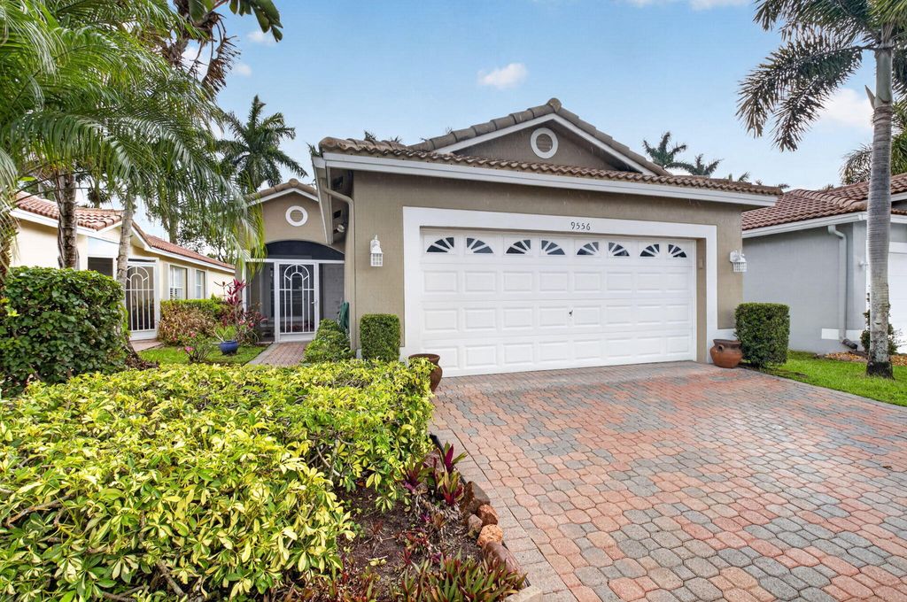 Photo of 9556 Cherry Blossom Court, Boynton Beach, FL 33437 (MLS # B26018308)