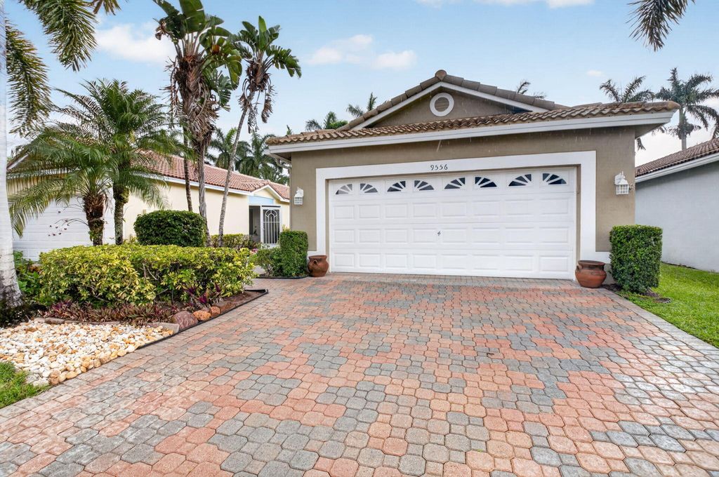 Photo of 9556 Cherry Blossom Court, Boynton Beach, FL 33437 (MLS # B26018308)