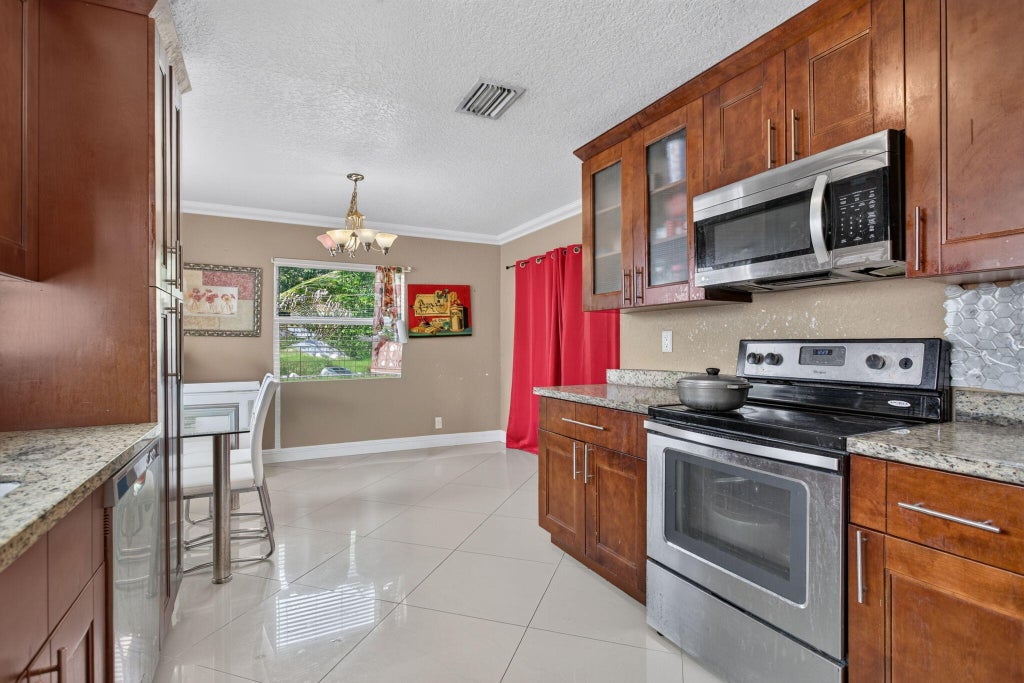 Photo of 6351 SW 10TH Court, North Lauderdale, FL 33068 (MLS # B26086454)