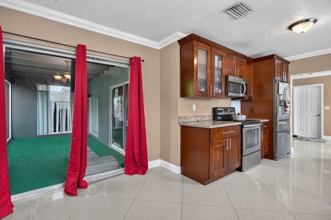 Tiny photo for 6351 SW 10TH Court, North Lauderdale, FL 33068 (MLS # B26086454)