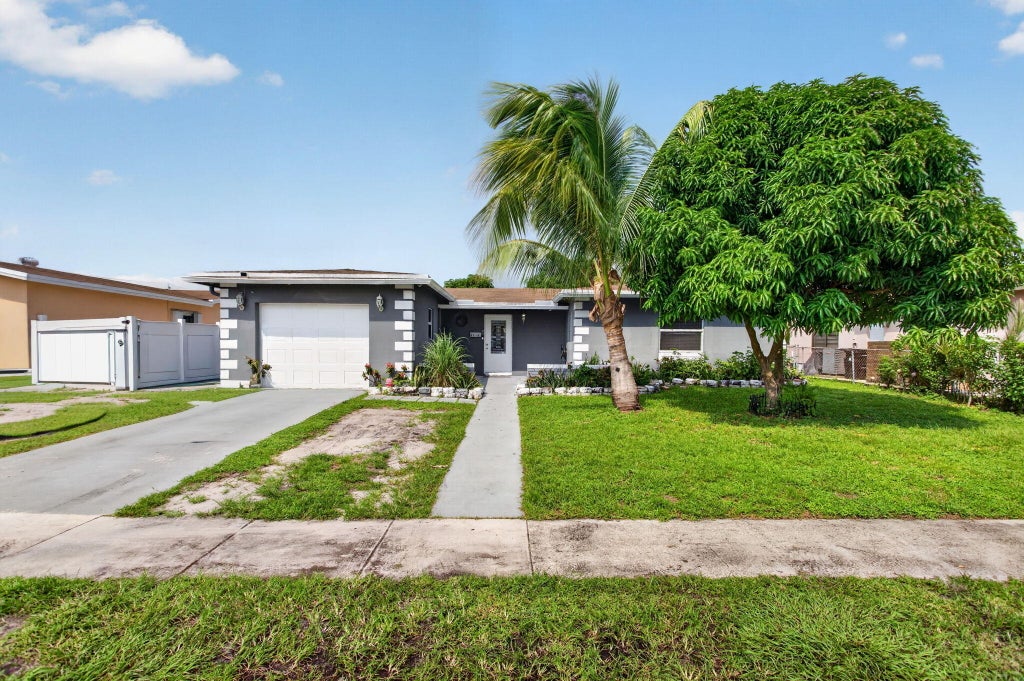 Photo of 6351 SW 10TH Court, North Lauderdale, FL 33068 (MLS # B26086454)
