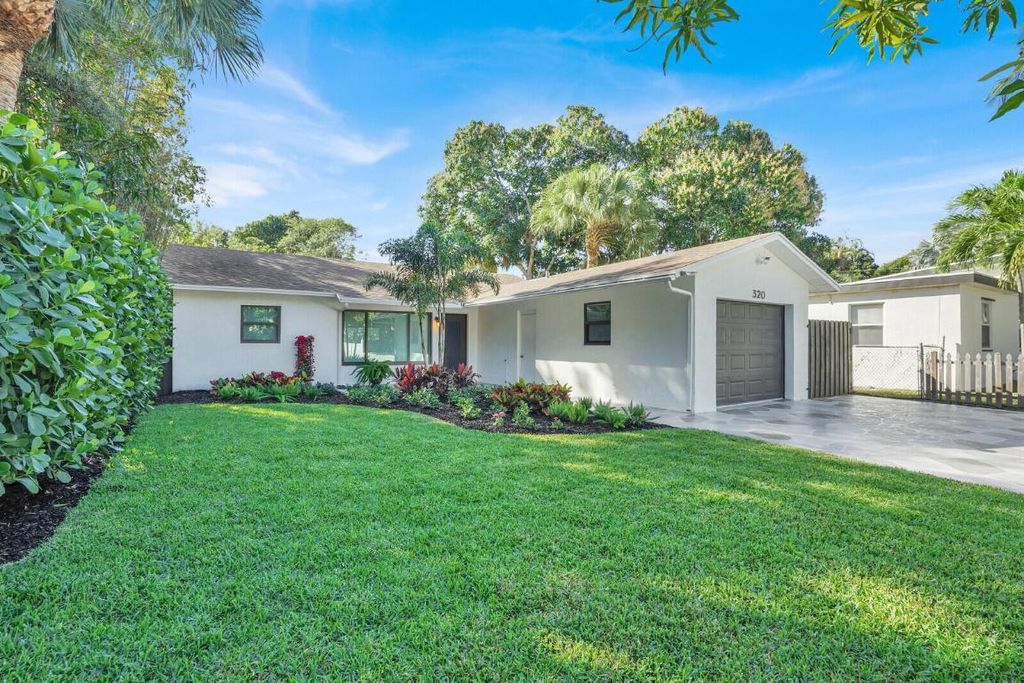 Photo of 320 33rd Street, West Palm Beach, FL 33407 (MLS # R11152904)