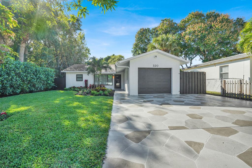 Photo of 320 33rd Street, West Palm Beach, FL 33407 (MLS # R11152904)