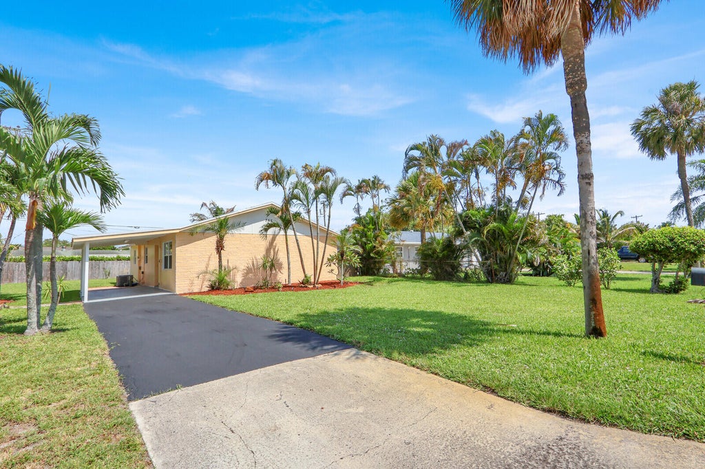 Photo of 357 Garden Boulevard, Palm Beach Gardens, FL 33410 (MLS # B26058870)