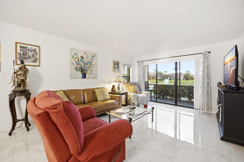 Photo of 722 Sunny Pine Way #B1, Greenacres, FL 33415 (MLS # B26035058)