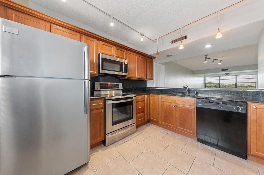 Photo of 3507 Village Boulevard #402, West Palm Beach, FL 33409 (MLS # R11168856)