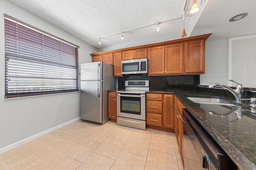 Photo of 3507 Village Boulevard #402, West Palm Beach, FL 33409 (MLS # R11168856)