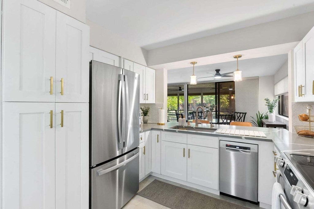 Photo of 11230 Green Lake Drive #204, Boynton Beach, FL 33437 (MLS # B26038029)