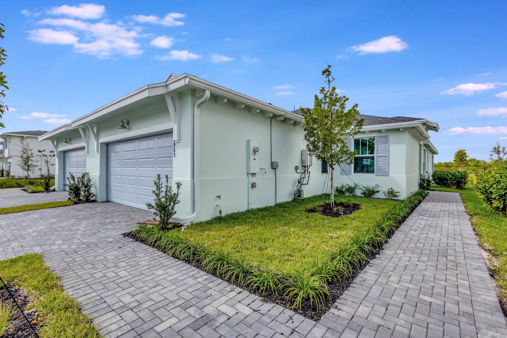 Photo of 18967 Wood Stork Way, Loxahatchee, FL 33470 (MLS # R11066341)