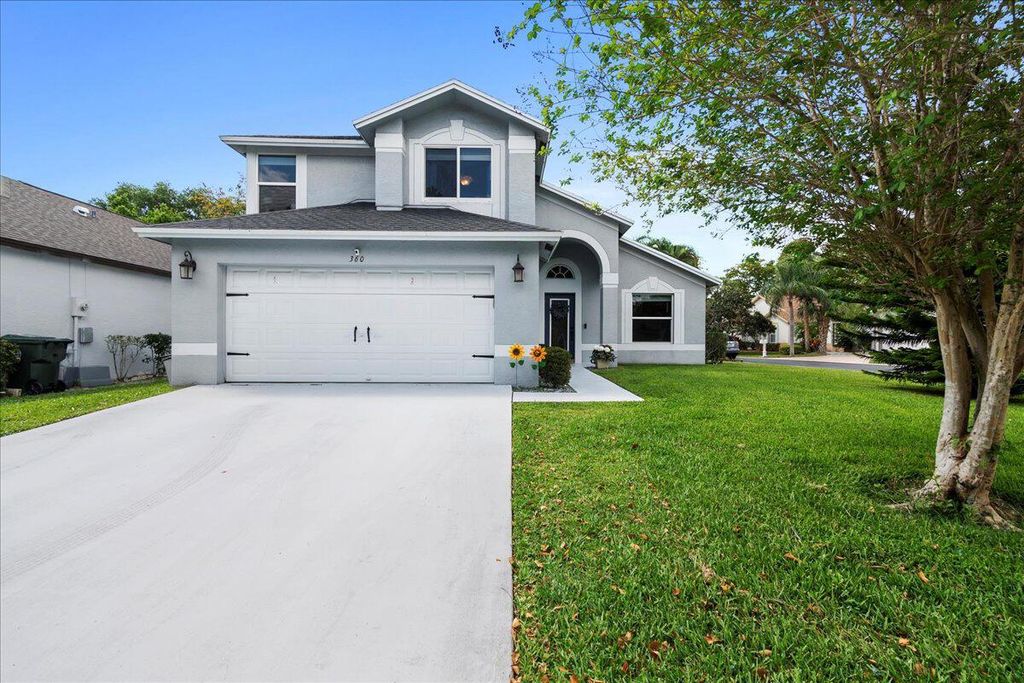 Photo of 360 Hammocks Trail, Greenacres, FL 33413 (MLS # R10973877)