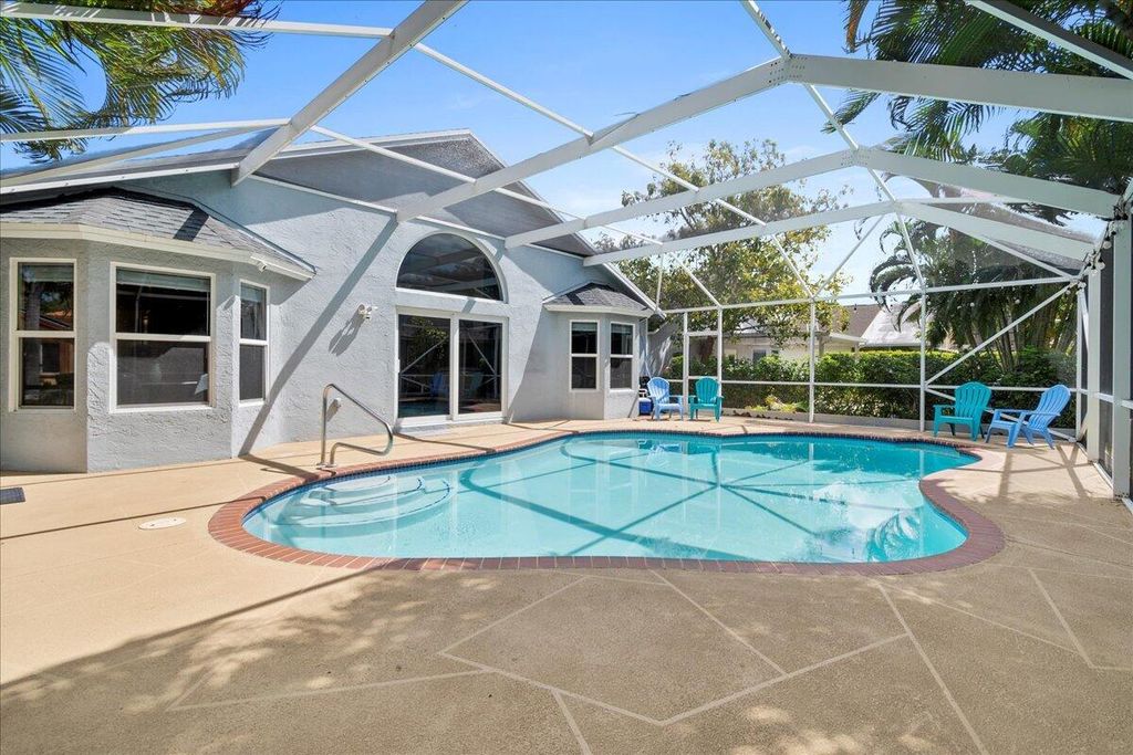Photo of 360 Hammocks Trail, Greenacres, FL 33413 (MLS # R10973877)