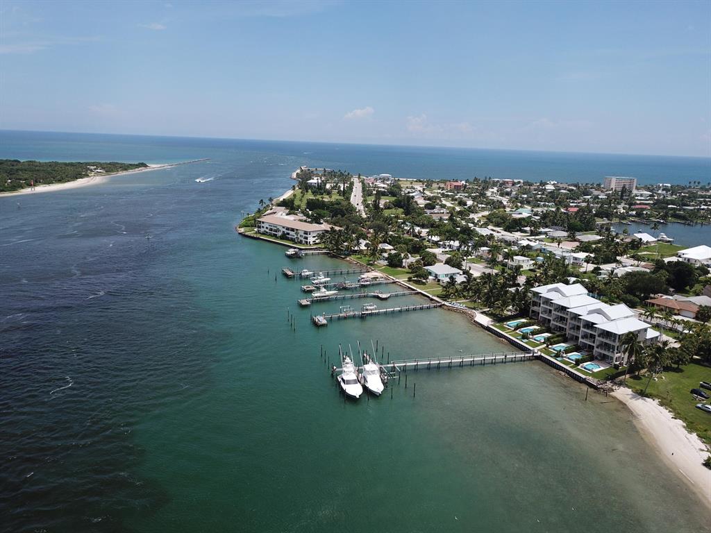 :Inlet Palms is a boater's paradise with spectacular views from every floor and private dock in your back yard. Unit #1 is the last corner unit available with the best location and lots of privacy. These luxury designed Smart homes are the wonder of Hutchinson Island. 3 Beds, 4.5 baths, Game Room, Private Elevator, 2990 (SF) under air with a total 4845 (SF). Highly upgraded. Central Vac, A/C in garage. 50+' Private Dock. A lot of planning has been put into this unit and it will show. It is proffessional decorated with high end furniture which is included in the price.Come and see what everyone is talking about!