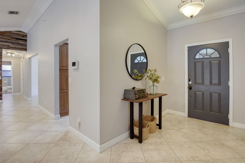 Photo of 542 Indigo Avenue, Wellington, FL 33414 (MLS # B26040784)