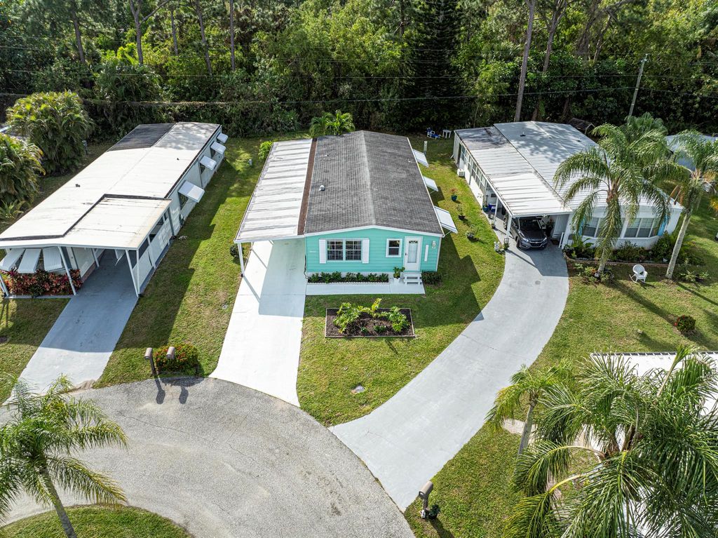 Photo of 14 SE La Mesa Lane, Port Saint Lucie, FL 34952 (MLS # R10954137)