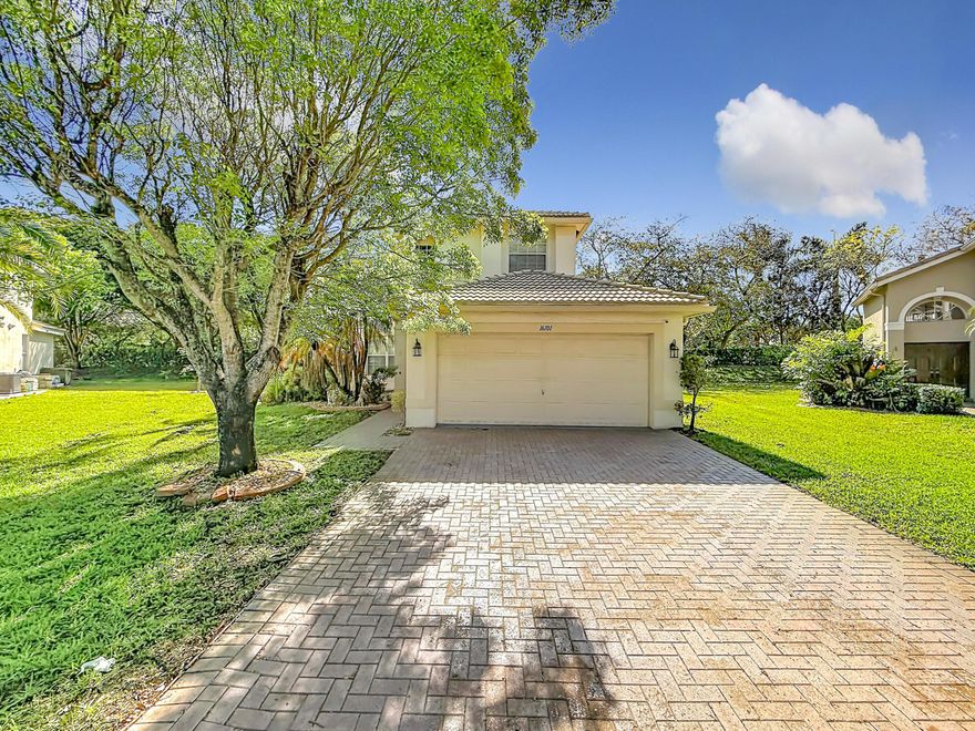Welcome to this beautiful 4BR/3BA home located on a quiet cul-de-sac in the sought-after gated community of Silver Isles in Miramar. This home features a bright, open layout with a first-floor bedroom and full bath, quartz countertops, stainless steel appliances, porcelain flooring, and updated bathrooms. Upstairs offers three spacious bedrooms, two full bathrooms, and a convenient laundry area. Additional highlights include a 2-car garage, extra-large driveway, and low HOA. Enjoy resort-style amenities including a clubhouse, pool, gym, playground, and 24/7 security. Conveniently located near A-rated schools, world-class shopping, hospitals, and major highways. A wonderful opportunity in one of Miramar's most desirable communities. One or more photos are virtually enhanced.