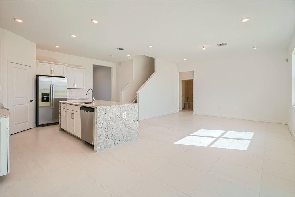 Photo of 2020 NE Ocean Dunes Drive, Jensen Beach, FL 34957 (MLS # R10897656)