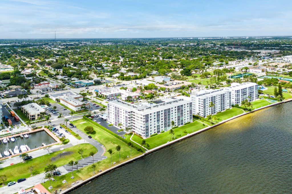 Photo of 301 Lake Shore Drive #411, Lake Park, FL 33403 (MLS # R11130410)