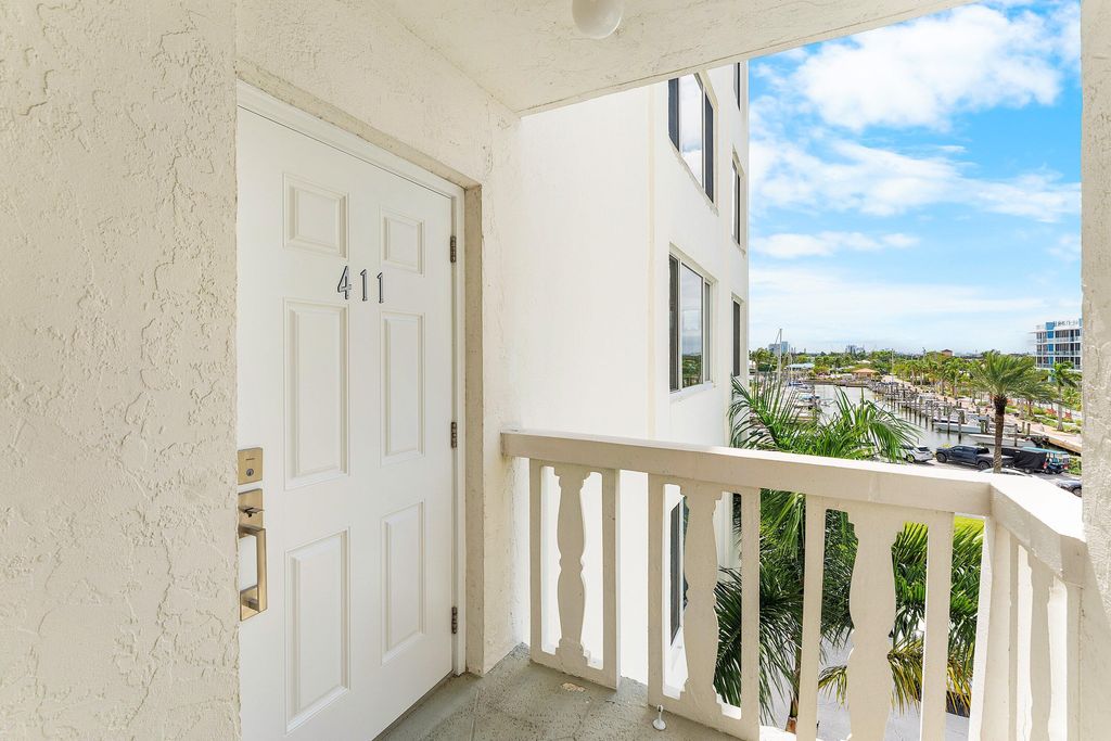 Photo of 301 Lake Shore Drive #411, Lake Park, FL 33403 (MLS # R11130410)