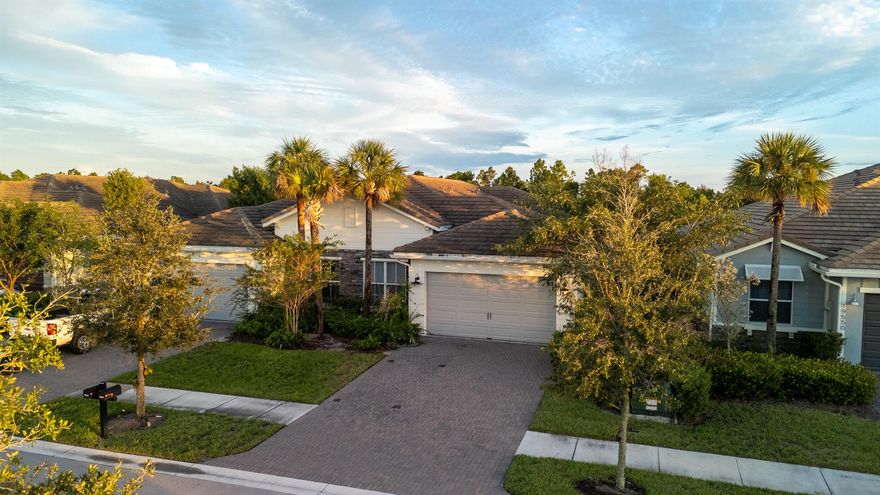 Here's your opportunity to live in ARDEN, resort-style, dual-level pool, fitness center, 9900sq. ft clubhouse with social spaces, tennis, pickleball and soccer field. Brand new Saddle View Elementary school just opened August 2025.This 3 BR/2BA Villa has a den/office and is totally upgraded. Open concept floor plan with 10 ft ceilings and impact windows & doors throughout. Beautiful kitchen w/quartz countertop, stainless steel appliances and custom window treatments. Tiled floors throughout. Owners suite has his-and-her walk in closets & a large bathroom with double sinks. Office/den has custom shelves.