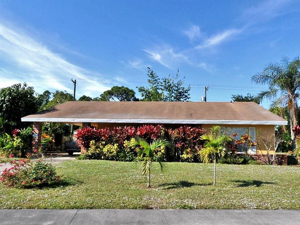 Photo of 240 NW Airoso Boulevard, Port Saint Lucie, FL 34983 (MLS # R10731648)